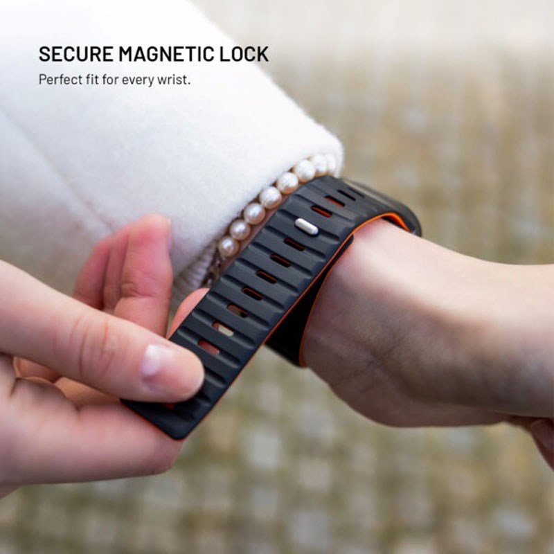 Apple Watch (42/44/SE/45/46/49mm) Fixed Magnetiskt Silikonarmband - Svart / Orange