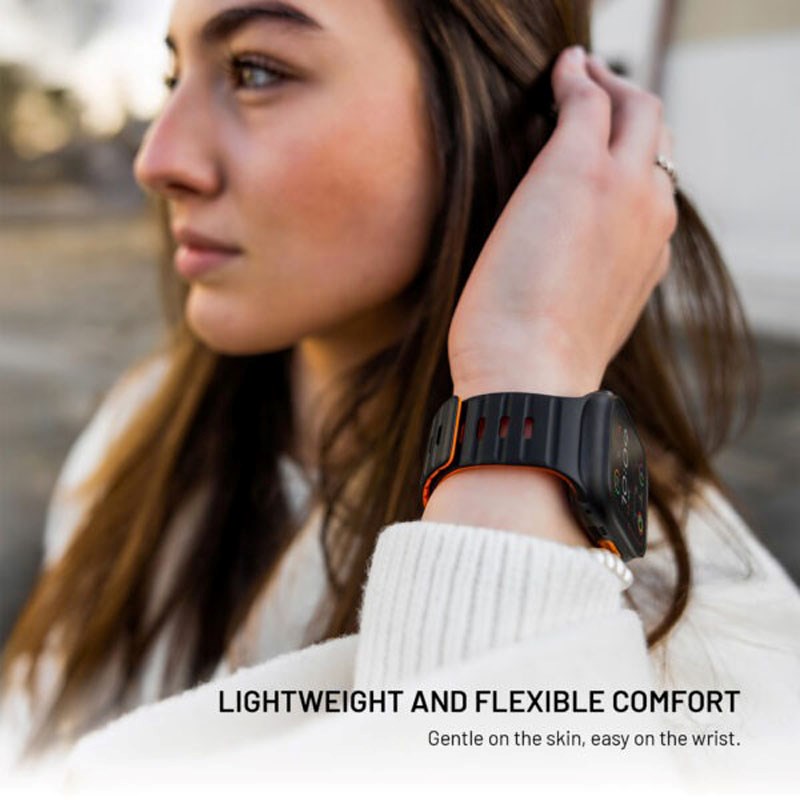 Apple Watch (42/44/SE/45/46/49mm) Fixed Magnetiskt Silikonarmband - Svart / Orange